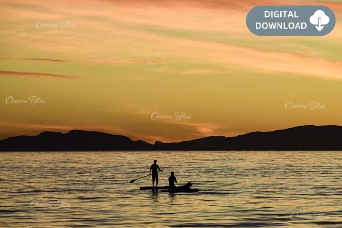 Family Paddleboarding at Sunset